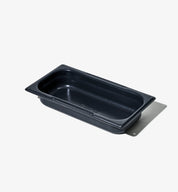 Rektangulär brödform i mörk metall, utan lock