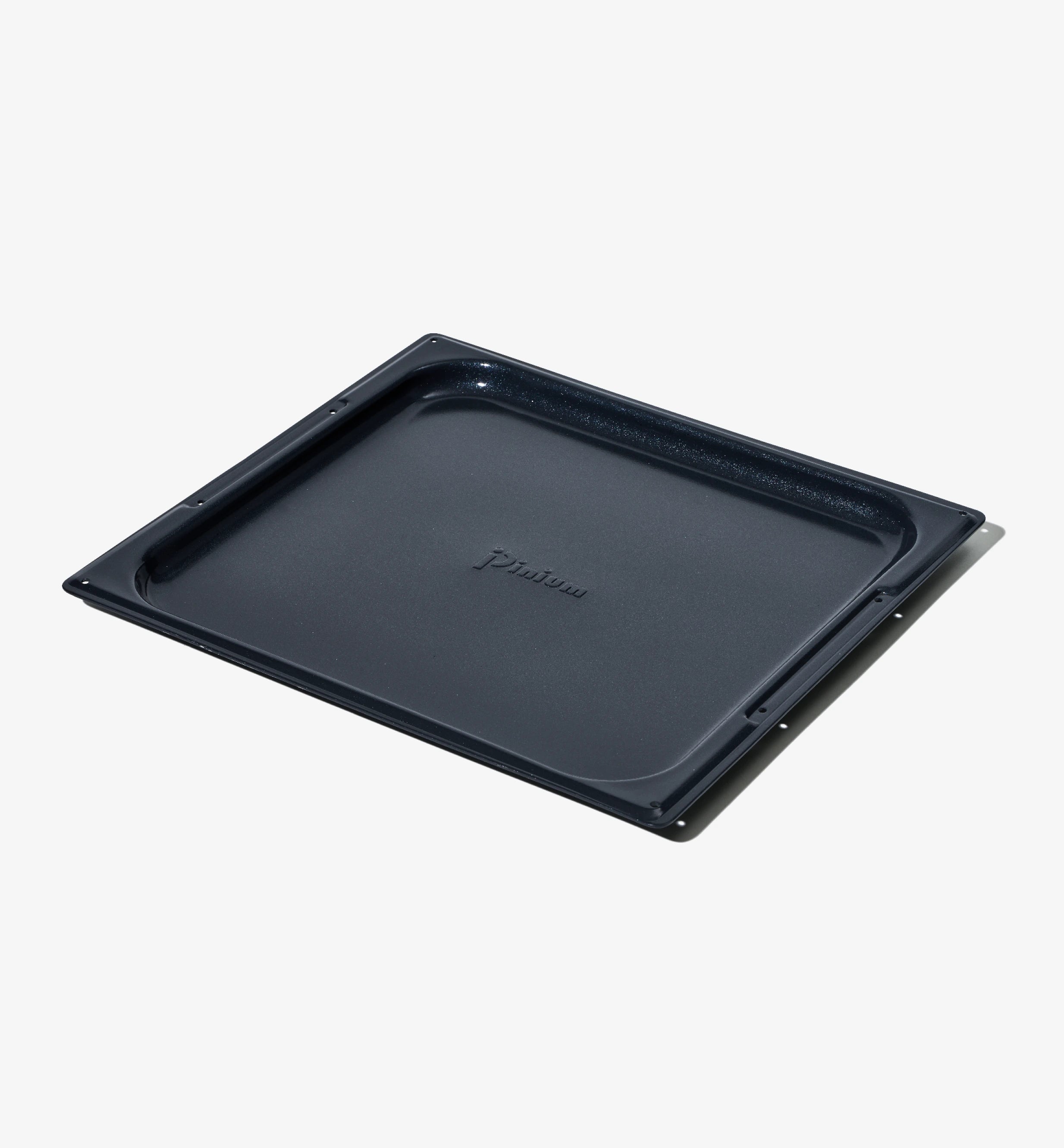 Pizzaplåt i non-stick, rektangulär ugnsform med upphöjda kanter.