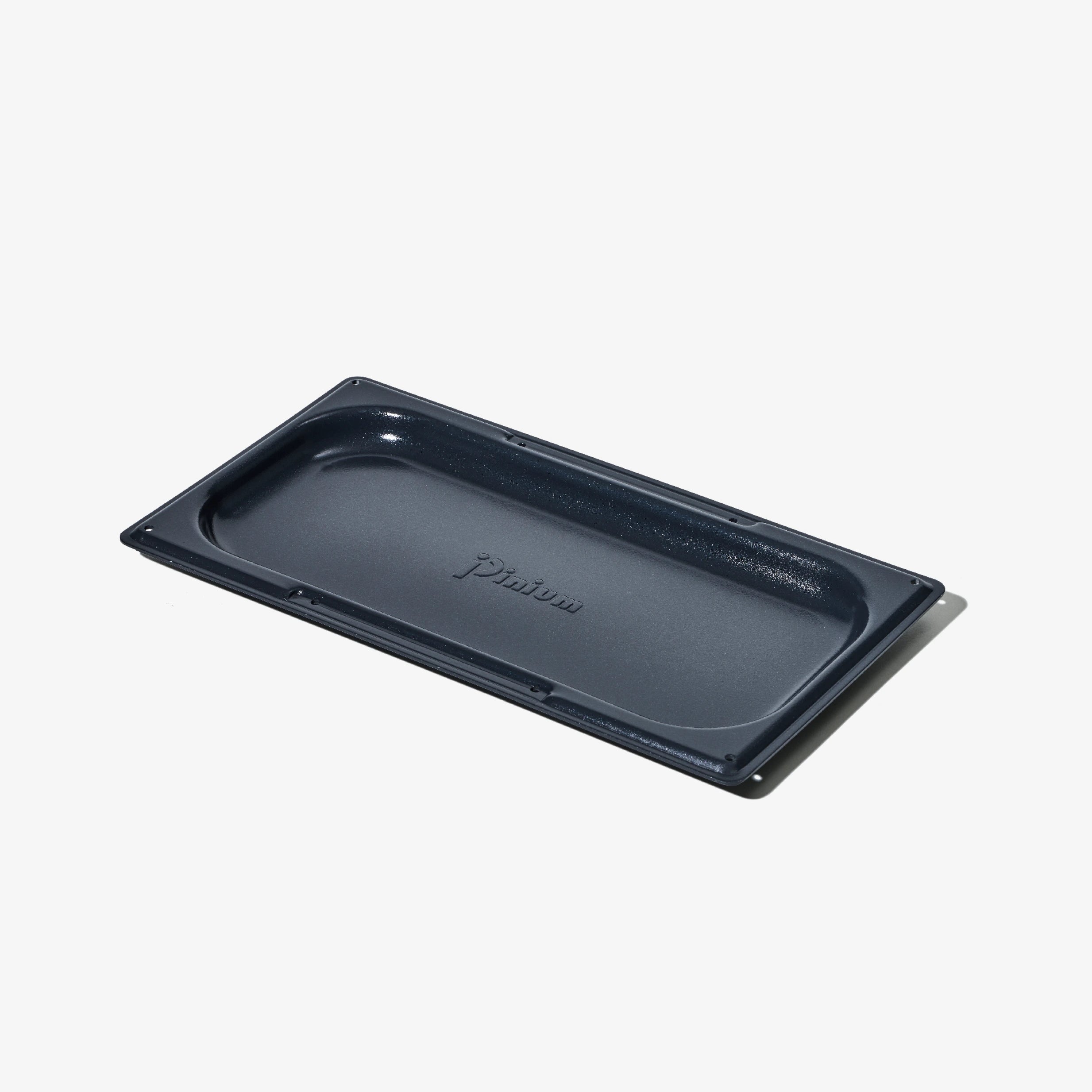 Pizzaplåt i non-stick sedd från sidan, rektangulär ugnsform.