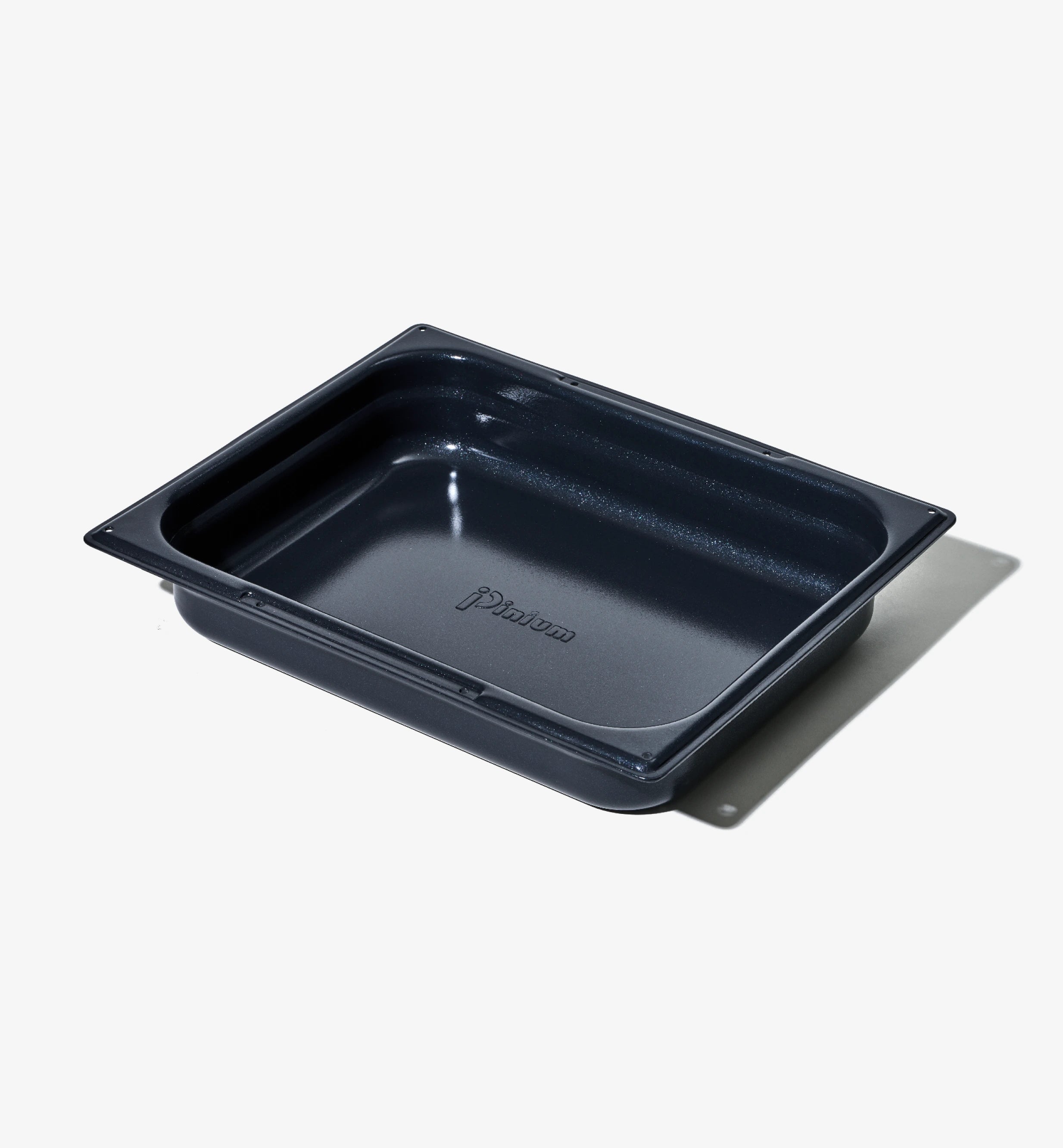 Ugnsform i mörkblått med non-stick-yta, sedd uppifrån, tom.